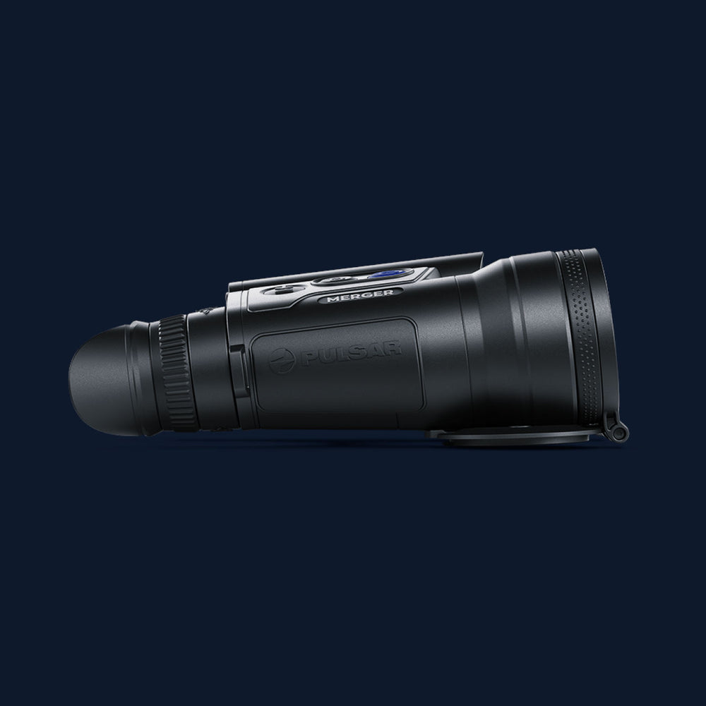 Side profile of Pulsar Merger XP35 LRF thermal binoculars showcasing compact build and control buttons. Designed for precision in outdoor optics.