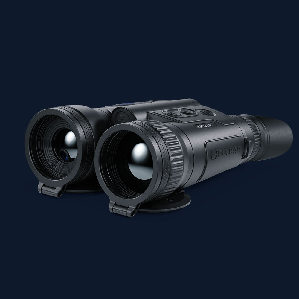 Angled view of Pulsar Merger XP35 LRF thermal binoculars highlighting lens clarity and ergonomic grip. Built for high-resolution thermal imaging.