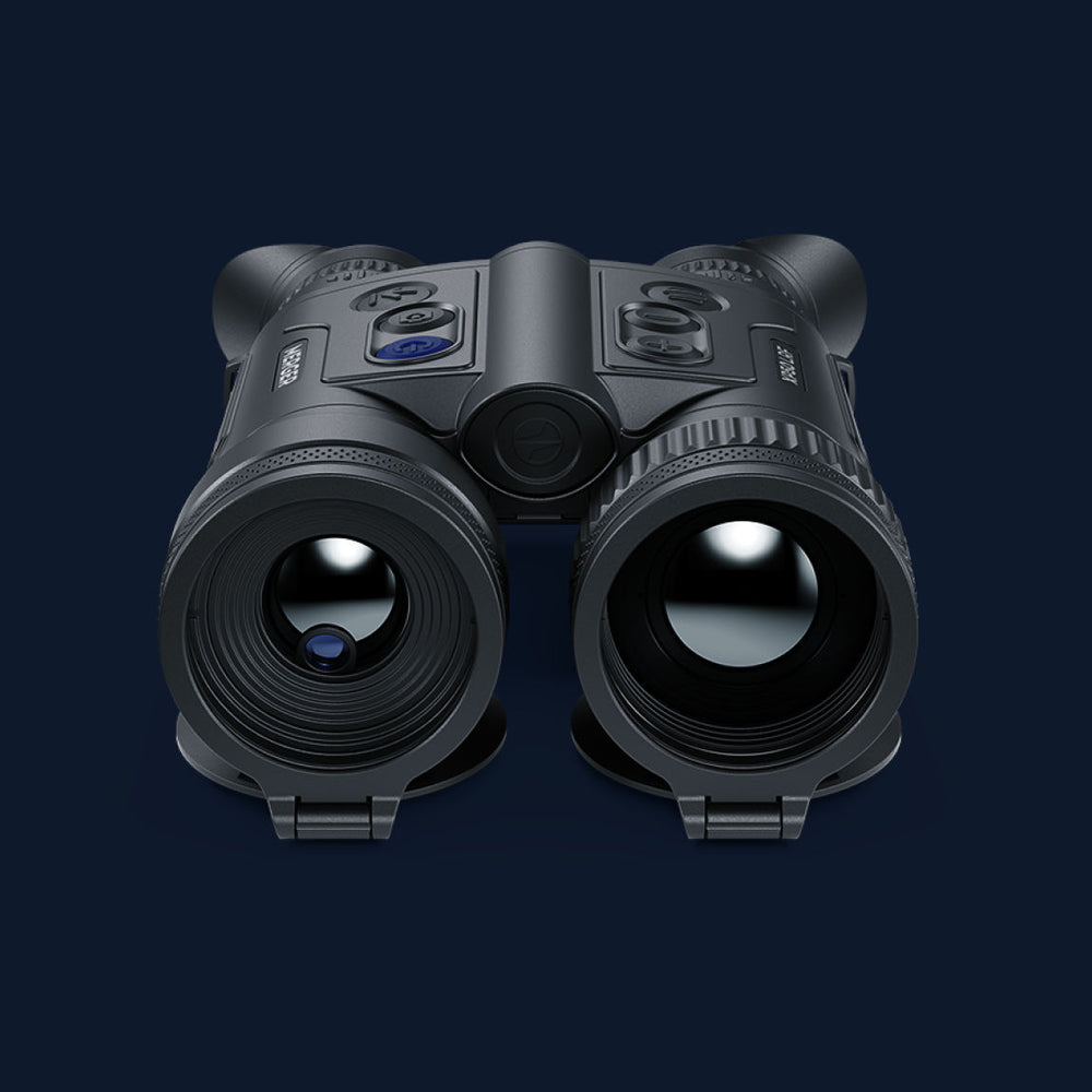 Front view of Pulsar Merger XP35 LRF thermal binoculars showing dual lenses and rugged design. Ideal for long-range thermal detection outdoors.