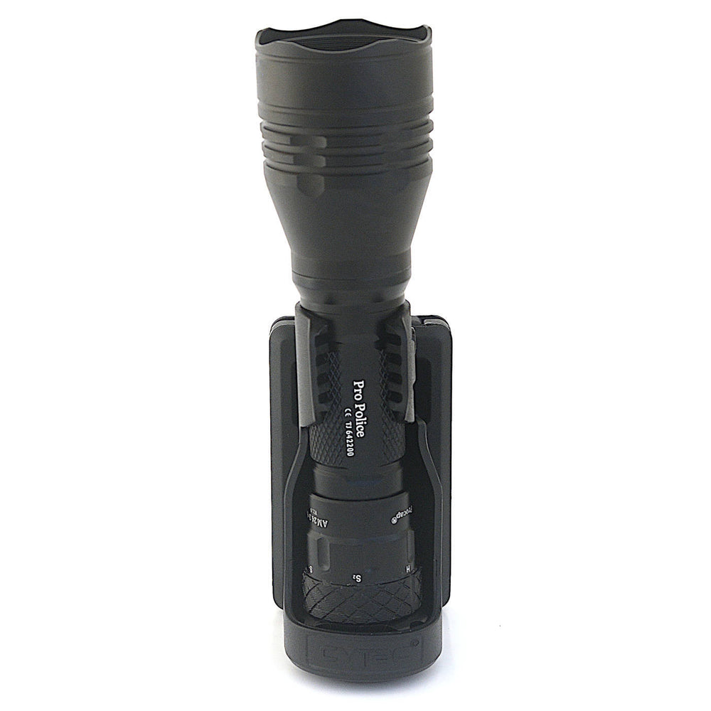 Large tactical flashlight fitted in Tactical Holster Molle, highlighting torch retention and rugged design for field use.