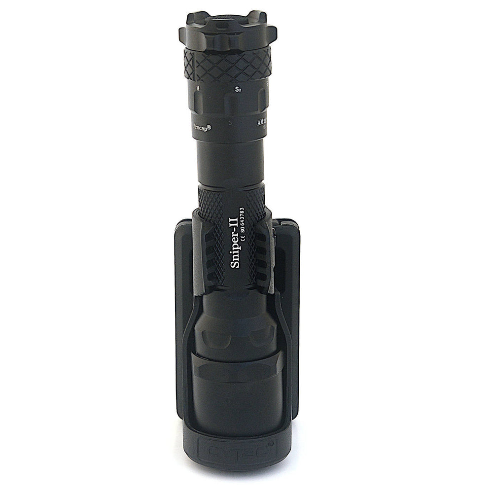 Single flashlight secured in Tactical Holster Molle, showcasing adjustable fit and durable polymer construction for tactical applications.