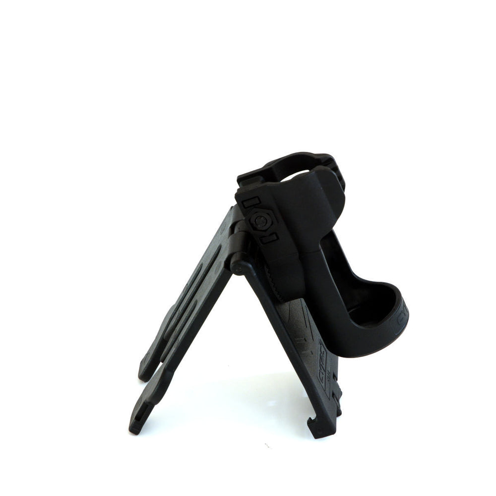 Side view of Tactical Holster Molle with open torch clamp and molle-compatible mount, designed for flexible gear attachment.