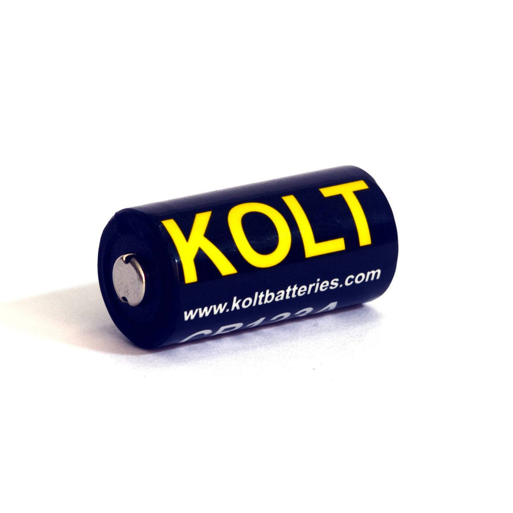 Side view of Kolt CR123A battery with bold yellow logo, part of a 100 pack for Wolf Eyes LED flashlight compatibility.