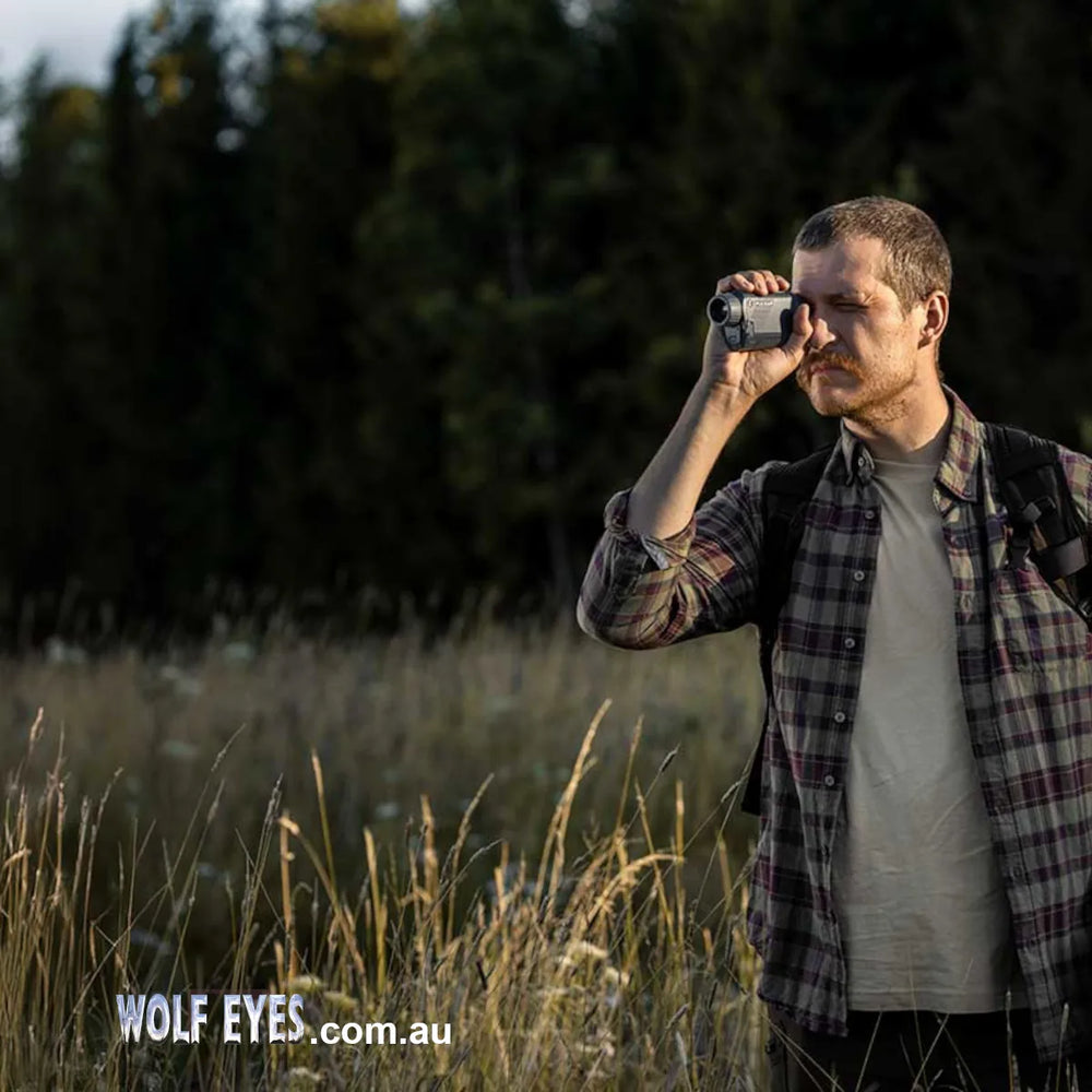 Axion XG30 thermal monocular in use in field