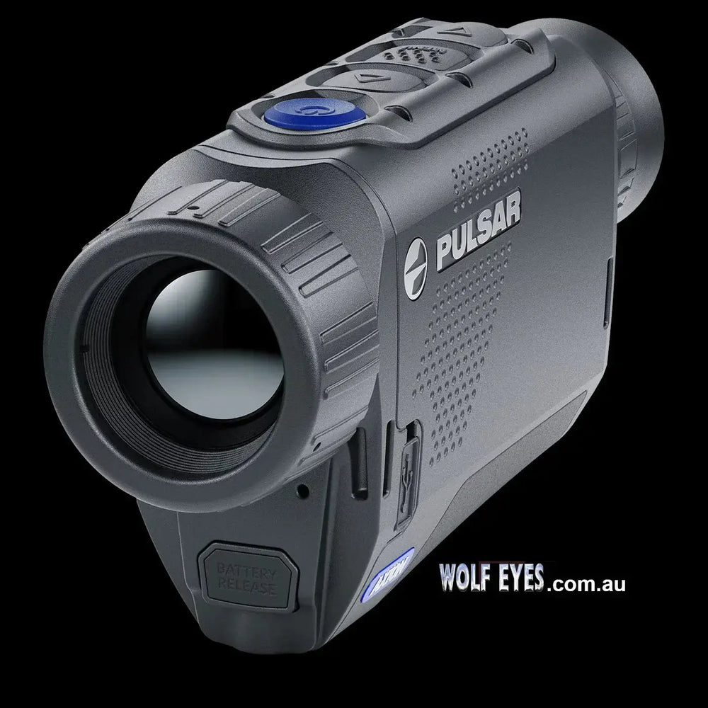 Front angled view of Pulsar Axion Compact XQ30 Pro with battery release button and Pulsar logo, designed for efficient thermal imaging use.