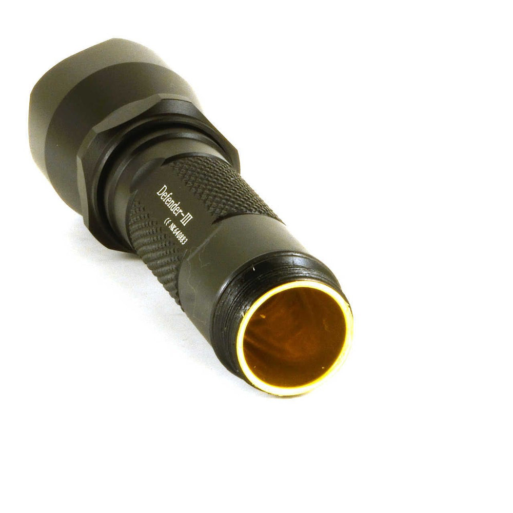 Wolf eyes flashlight showing brass thermal transfer tube
