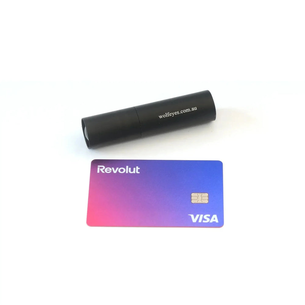 USB Keylight - Portable USB Light shown next to a credit card for size comparison, highlighting its 87mm pocket-sized form.